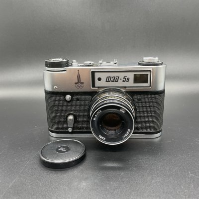купить Фотоаппарат "ФЭД-5" с олимпийской символикой, объективом "Индустар-61 Л/Д" в родном кофре и документами, металл, пластик, стекло, кожа, Харьковский машиностроительный завод им. Дзержинского (ФЭД), СССР, 1978 г.