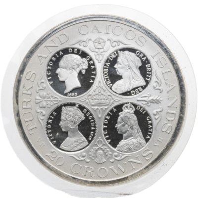 купить Тёркс и Кайкос 20 крон (crowns) 1976 "4 портрета королевы Виктории" в официальном буклете