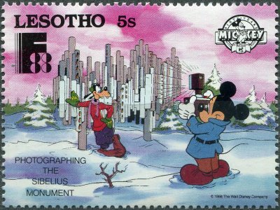 купить Лесото Почтовая марка 1988 "Фотографирование памятника Сибелиусу - Гуфи, Микки"