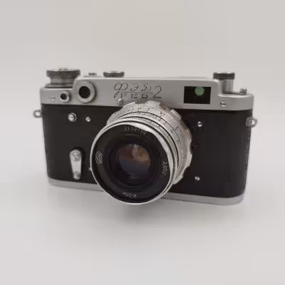 купить Фотоаппарат пленочный "ФЭД-2" с объективом "Индустар-26м" в оригинальном кофре, металл, пластик, стекло, кожа, Харьковский машиностроительный завод им. Дзержинского (ФЭД), СССР, 1955-1970 гг.
