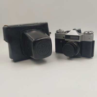 купить Фотоаппарат плёночный "Зенит-Е" с объективом "Индустар-50-2" в оригинальном кофре, металл, стекло, пластик, кожа, Белорусское оптико-механическое объединение (БелОМО), СССР, 1984 г.