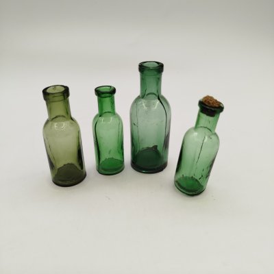 купить Набор из четырех аптечных пузырьков зеленого оттенка, стекло, Россия, 1900-1930 гг.