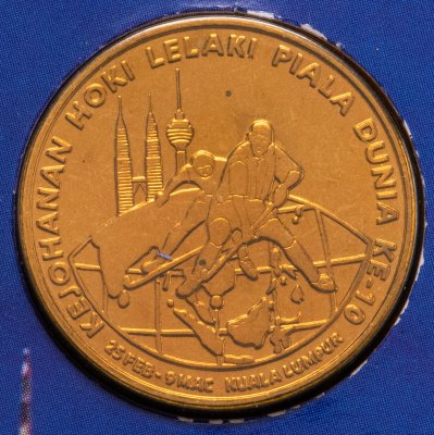 купить Малайзия 1 ринггит 2002 "X Чемпионат мира по хоккею на траве среди мужчин" в буклете