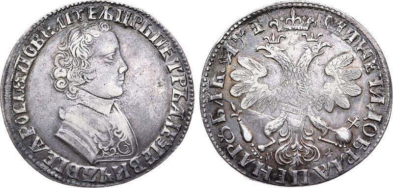 Необычный петровский рубль, полученный перечеканом