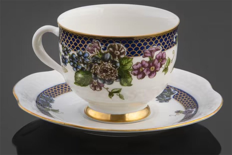 Пара чайная с декором в виде цветов и бабочек, мануфактура "Reichenbach"