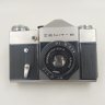 Купить Фотоаппарат "Зенит-В" с объективом "Индустар-50-2" в оригинальном кофре, металл, пластик, кожа, стекло, Красногорский механический завод (КМЗ), СССР, 1972 г.