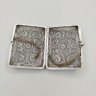 Купить Ажурный дамский портсигар, выполненный в технике скани, мельхиор (медь-никель), серебрение, СССР, 1950-1970 гг.