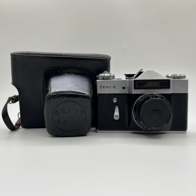 купить Фотоаппарат "Зенит-Е" с объективом "Индустар-50-2"в оригинальном кофре, металл, стекло, пластик, кожа, Красногорский механический завод (КМЗ), СССР, 1965-1986 гг.