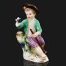 Купить Статуэтка "Мальчик с виноградом", автор модели Иоганн Иоахим Кендлер, фарфор, роспись, золочение, Meissen (Мейсенский фарфор), Германия, 1910-1940 гг.