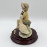 Купить Статуэтка "Девочка с утокой" автор G.Armani, фарфор, дерево, роспись, Capodimonte (Каподимонте), Италия, 1993-2000 гг.