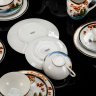 Купить Сервиз чайный с пейзажным декором и рельефным изображением лица гейши на 6 персон (21 предмет), клеймо "Kutani hand painted Japan", фарфор, роспись, золочение, Япония, 1950-1980 гг.