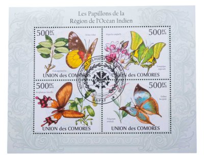 купить Коморские острова квартблок из 4 марок "Флора и фауна. Бабочки"