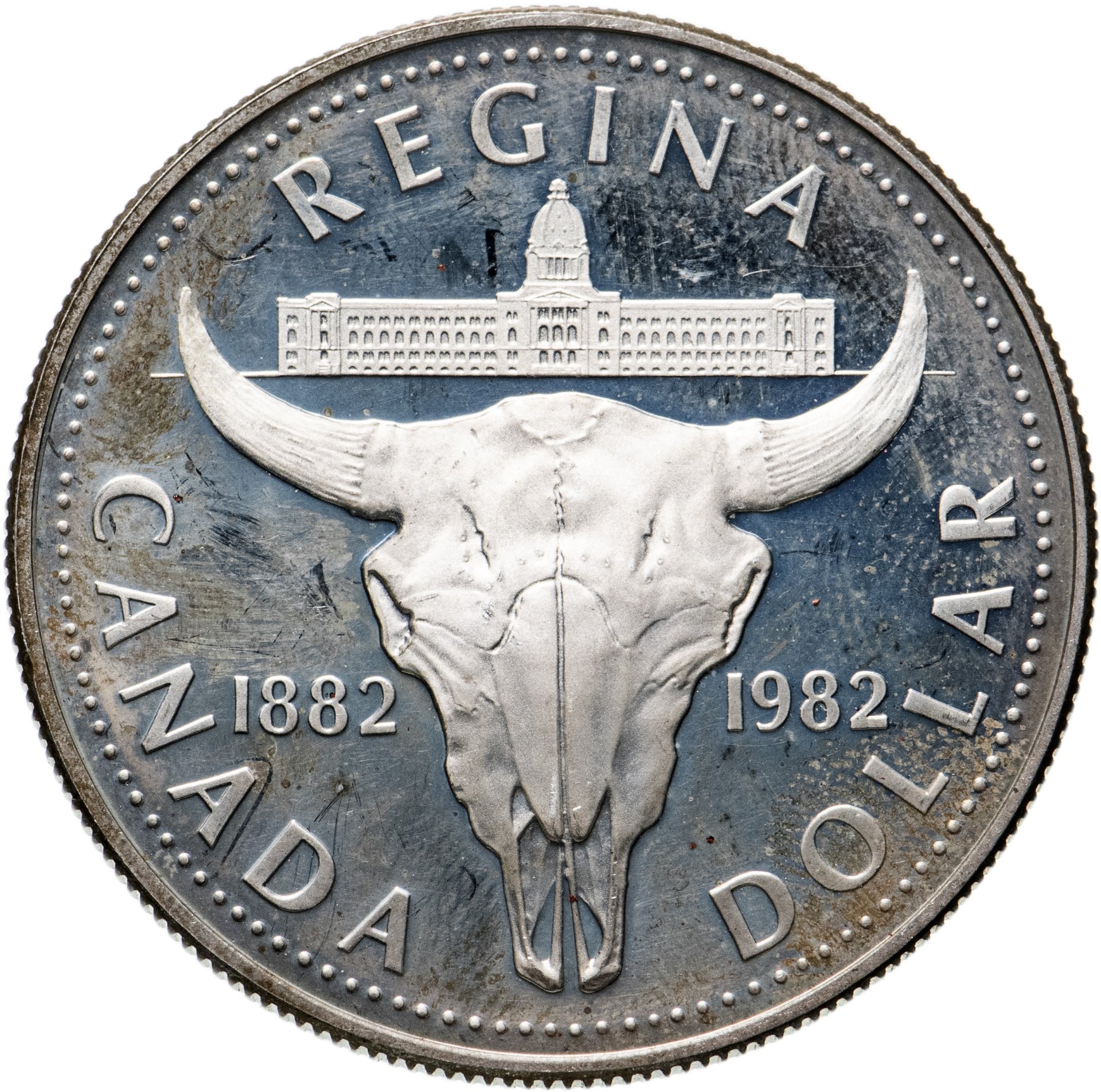 Монета Канада 1 доллар (dollar) 1982 100 лет городу Реджайна стоимостью ...