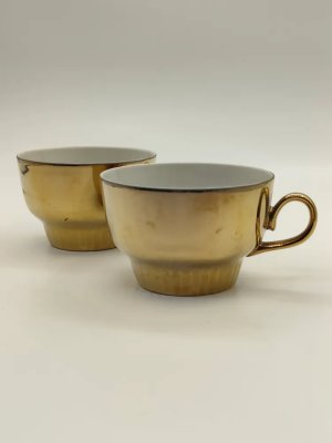 купить Пара чашек золотого цвета, фарфор, крытье, Завод «Красный фарфорист» (Чудово, Грузинская фарфорово-фаянсовая фабрика), СССР, 1992 г.