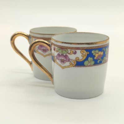 купить Пара кофейных чашек, украшенных растительным декором, форма "Литрон", Limoges Elte', фарфор, деколь, золочение, Франция, 1920-1940 гг.