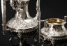 Купить Кофейник и сахарница, украшенные маскаронами, цветочными гирляндами и фигурными хватками в виле соцветий, металл, серебрение, гравировка, канфарение, рог, Западная Европа, 1920-1950 гг.