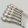Купить Набор из 6-ти столовых ножей, украшенных растительным декором, мНЦ (медь-никель-цинк), нержавеющая сталь, Режевский механический завод (РМ), СССР, 1983-1991 гг.