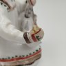 Купить Статуэтка "Девочка-якутка с севрюгой", фарфор, роспись, Ленинградский фарфоровый завод (ЛФЗ), СССР, 1970-1980 гг.
