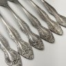 Купить Набор из 6 столовых вилок, украшенных флоральным декором, нержавеющая сталь, Павловский завод художественных металлоизделий им. С.М. Кирова, СССР, 1973-1990 гг.