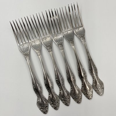 купить Набор из 6 столовых вилок, украшенных флоральным декором, нержавеющая сталь, Павловский завод художественных металлоизделий им. С.М. Кирова, СССР, 1973-1990 гг.