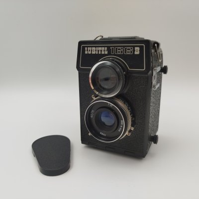 купить Фотоаппарат "Любитель-166" в кофре, металл, стекло, бакелит, ЛОМО (Ленинградское оптико-механическое объединение), СССР, 1976-1996 гг.