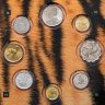 Купить Набор из 16-ти  монет разных стран мира "Исчезающие животные" в буклете