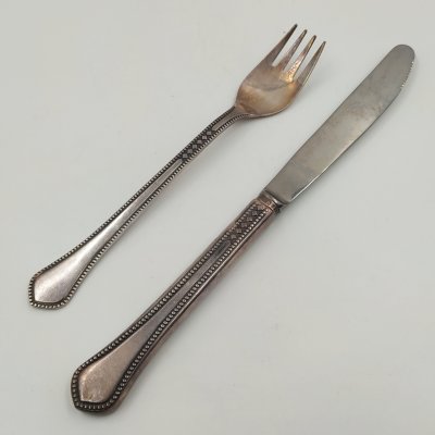 купить Набор столовых приборов на одну персону (вилка и нож) в оригинальном пакете с вкладышем, Таллинский опытный завод научного приборостроения "Дельта", мельхиор (медь-никель), сталь, СССР, 1970-1980 гг.