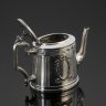 Купить Чайник заварочный с рельефным декором в виде меандра, колонн и картушей, в один из которых заключена монограмма, латунь, серебрение, полимерный материал, Bracia Henneberg (Братья Хеннеберг, Варшава), Польша, 1898-1939 гг.