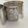Купить Набор винтажных колец для салфеток на 6 персон, украшенных растительным декором и произвольной нумерацией, мНЦ (медь-никель-цинк), Артель «Промтехсвязь», СССР, 1950-1960 гг.
