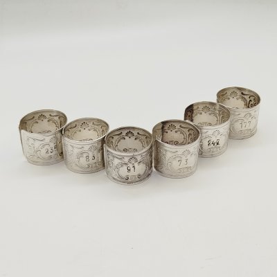 купить Набор винтажных колец для салфеток на 6 персон, украшенных растительным декором и произвольной нумерацией, мНЦ (медь-никель-цинк), Артель «Промтехсвязь», СССР, 1950-1960 гг.