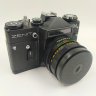 Купить Фотоаппарат "Зенит-ЕМ" с объективом "Гелиос-44М" в оригинальном кофре и коробке, с паспортом, металл, стекло, пластик, кожа, картон, Красногорский механический завод (КМЗ), СССР, 1983 г.