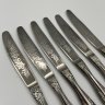 Купить Набор из 6 столовых ножей, украшенных растительным декором, нержавеющая сталь, Павловский завод художественных металлоизделий им. С.М. Кирова, СССР, 1970-1990 гг.