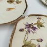 Купить Набор десертных тарелок в стиле модерн, выполненных в форме листьев с изображением полевых цветов, (3 шт.), фарфор, роспись, золочение, Западная Европа, 1910-1930 гг.