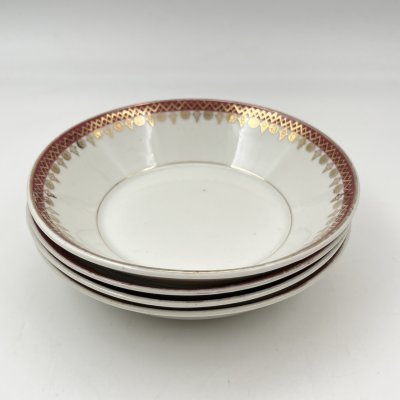 купить Набор из четырех десертных тарелочек (розеток) с орнаментальной каймой, клеймо «Новгубфарфор», фарфор, обводка, золочение, Завод «Красный фарфорист» (Чудово, Грузинская фарфорово-фаянсовая фабрика), СССР, 1923-1927 гг.