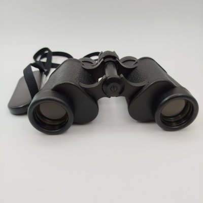 купить Бинокль призменный БПЦ 5 8х30м в чехле и кробке с инструкцией, металл, стекло, пластик, картон, Казанский оптико-механический завод (КОМЗ), Российская Федерация, 1999 г.