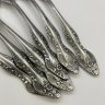 Купить Набор из 6-ти столовых ложек, украшенных растительным декором, нержавеющая сталь, Павловский завод художественных металлоизделий им. С.М. Кирова, СССР, 1970-1990 гг.