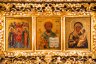 Купить Икона-триптих составная: "Собор Архистратига Михаила", "Св. Николай Чудотворец" и "Тихвинская икона Божией Матери", в киоте с растительным декором, дерево, резьба, темпера, масло, золочение, эгломизе, Российская империя, 1870-1890 гг.