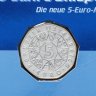 Купить Австрия 5 евро (euro) 2005 UNC "100 лет лыжному спорту" в официальном буклете