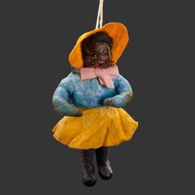 купить Елочная игрушка "Девочка-негритянка в желтой шляпке", вата, мастика, роспись, бумага, СССР, 1930-1950 гг.