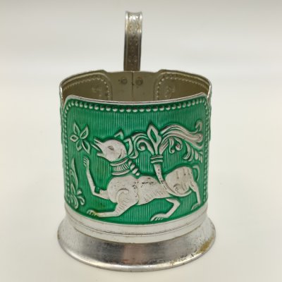 купить Подстаканник "Сказочные животные" на зеленом фоне, алюминий, крашение, чеканка, Завод художественной гравюры на металле, СССР, 1973-1991 гг.