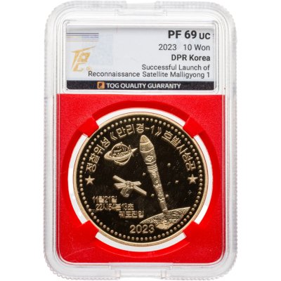 купить Северная Корея 10 вон 2023 "Успешный запуск разведывательного спутника Malligyong 1" в слабе TQG PF69