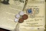 Купить "Григорий Распутин" - набор из 5 монет и 1 марки, выпущенных при Николае II, в альбоме с историческим описанием и сертификатом подлинности