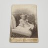 Купить Фотография с изображением ребенка, фотоателье "Леон и Ко", г. Санкт-Петербург, бумага, фотопечать, картон, Российская империя, 1900-1917 гг.