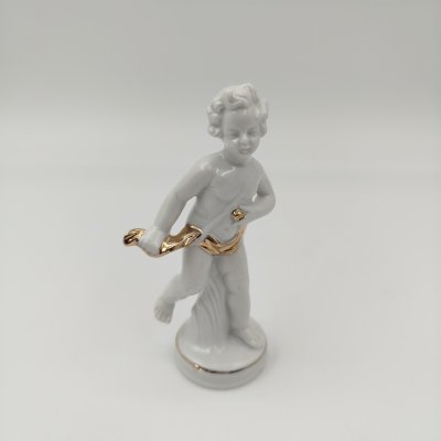 купить Статуэтка "Путти с золотой лентой", фарфор, золочение, VEB Porzellanfiguren Lippelsdorf (Липпельсдорф), ГДР, 1974-1990 гг.