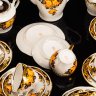 Купить Сервиз кофейный с декором в виде желтых роз, форма "Ария" ("Arija"), автор формы Левон Агаджанян, на 6 персон (21 предмет), фарфор, деколь, золочение, Рижский фарфорово-фаянсовый завод, СССР, 1970-1990 гг.