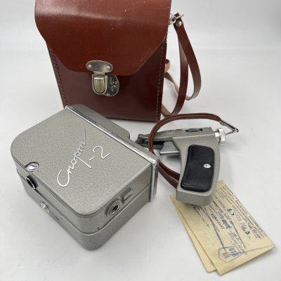 купить Кинокамера "Спорт-2" в оригинальном кофре и аттестатом, металл, стекло, искусственная кожа, Государственный оптико-механический завод имени ОГПУ (ГОМЗ), СССР, 1963 г.