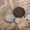 Купить "Александр Сергеевич Пушкин (1799-1837 гг.)" - набор из 3 монет в альбоме с историческим описанием и сертификатом подлинности