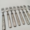 Купить Набор из 8-ми столовых вилок, украшенных рельефным декором, сталь, Curdts Nachfolger, E.H. Otto GmbH, Solingen, Германия, 1930-1940 гг.