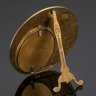 Купить Рамка для фотографии округлой формы в стиле модерн, декорирована рельефным изображением девушки с лавровым венком в руках, латунь, Западная Европа, 1920-1930 гг.