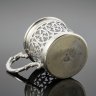 Купить Подстаканник с ажурным туловом и фигурной ручкой, латунь, серебрение, Norblin & Co (Норблин), Российская империя, 1860-1880 гг.